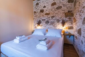 1 غرفة نوم ومكواة/لوح كي وواي فاي وملاءات أسرّة