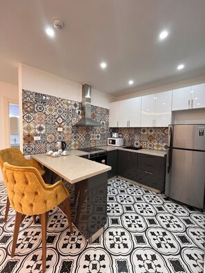 Family Suite, 2 Bedrooms, Non Smoking, City View | Private kitchen | Full-size fridge, electric kettle - Zemilo hotel apartment (Addis Ababa)