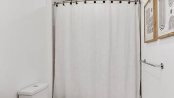Hair dryer, towels, soap, shampoo