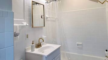 Hair dryer, towels, soap, shampoo