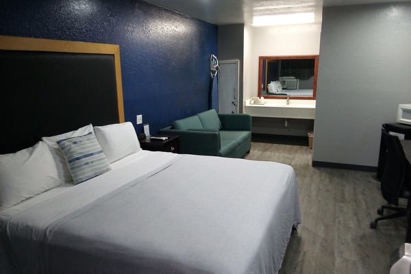 Basic Triple Room, 1 King Bed with Sofa bed, Non Smoking | Laptop workspace, blackout drapes, soundproofing, iron/ironing board