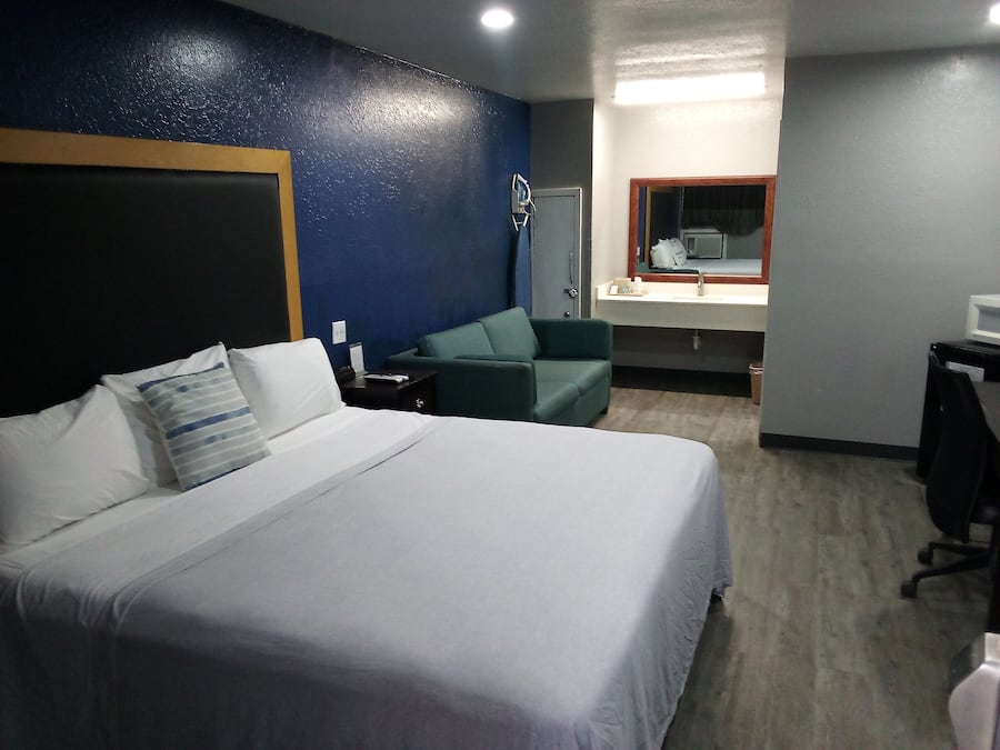 Basic Triple Room, 1 King Bed with Sofa bed, Non Smoking | Laptop workspace, blackout curtains, soundproofing, iron/ironing board