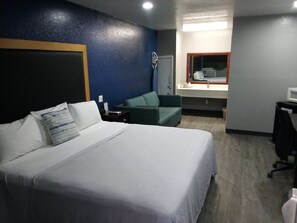 Basic Triple Room, 1 King Bed with Sofa bed, Non Smoking | Laptop workspace, blackout drapes, soundproofing, iron/ironing board - Coachman's Inn & Suites (Waldron)