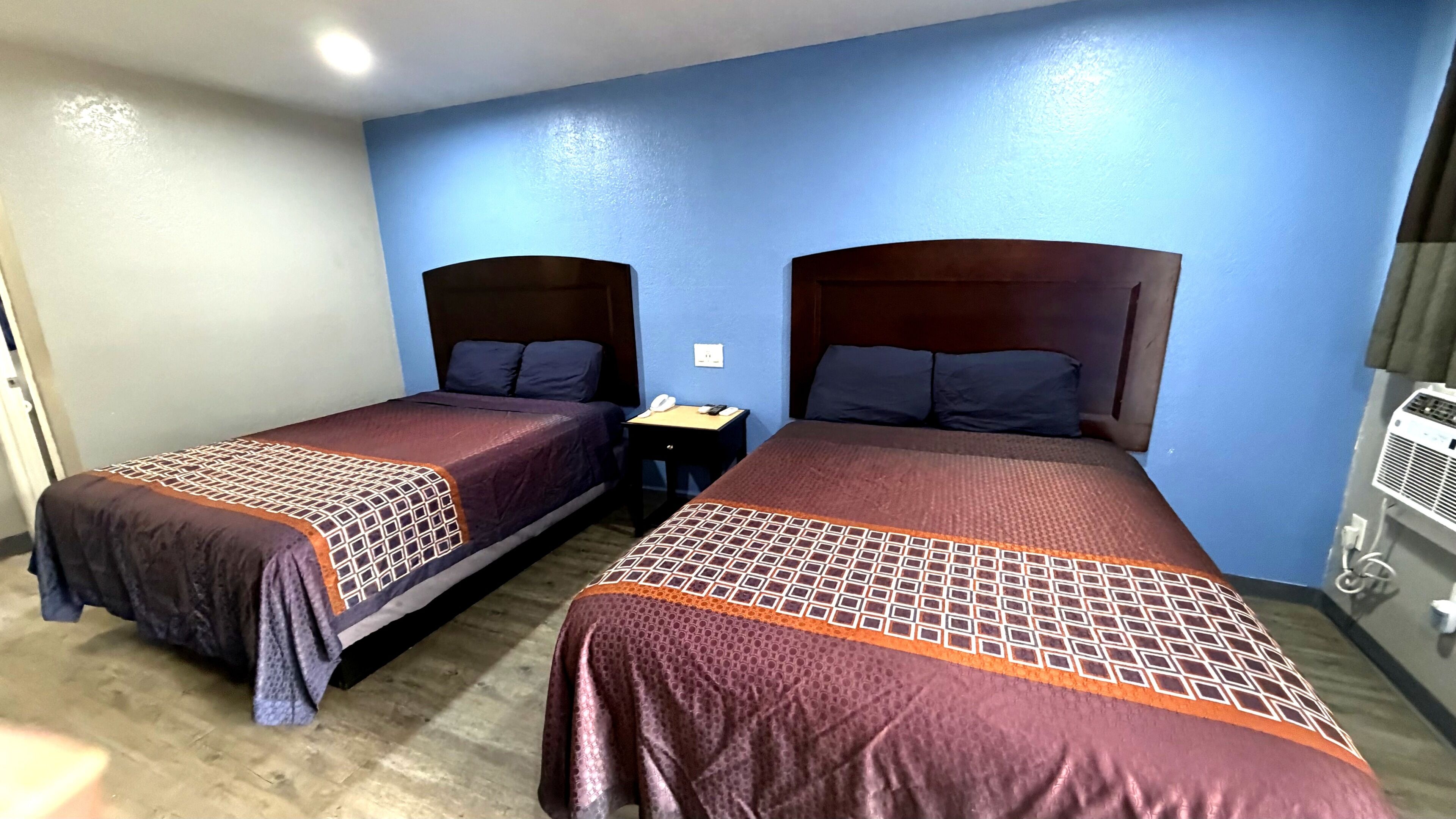 Basic Single Room, 2 Queen Beds | Laptop workspace, blackout drapes, soundproofing, iron/ironing board