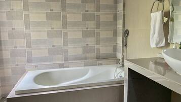 Hair dryer, bidet, towels, soap