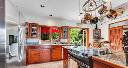 Oceanfront sanctuary with light-filled interior, lanai, W/D, & full kitchen