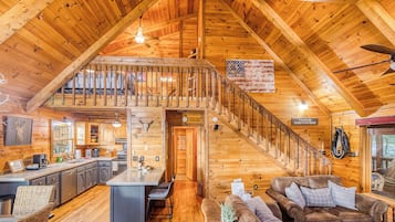 Smart TV, fireplace, books, computer monitors