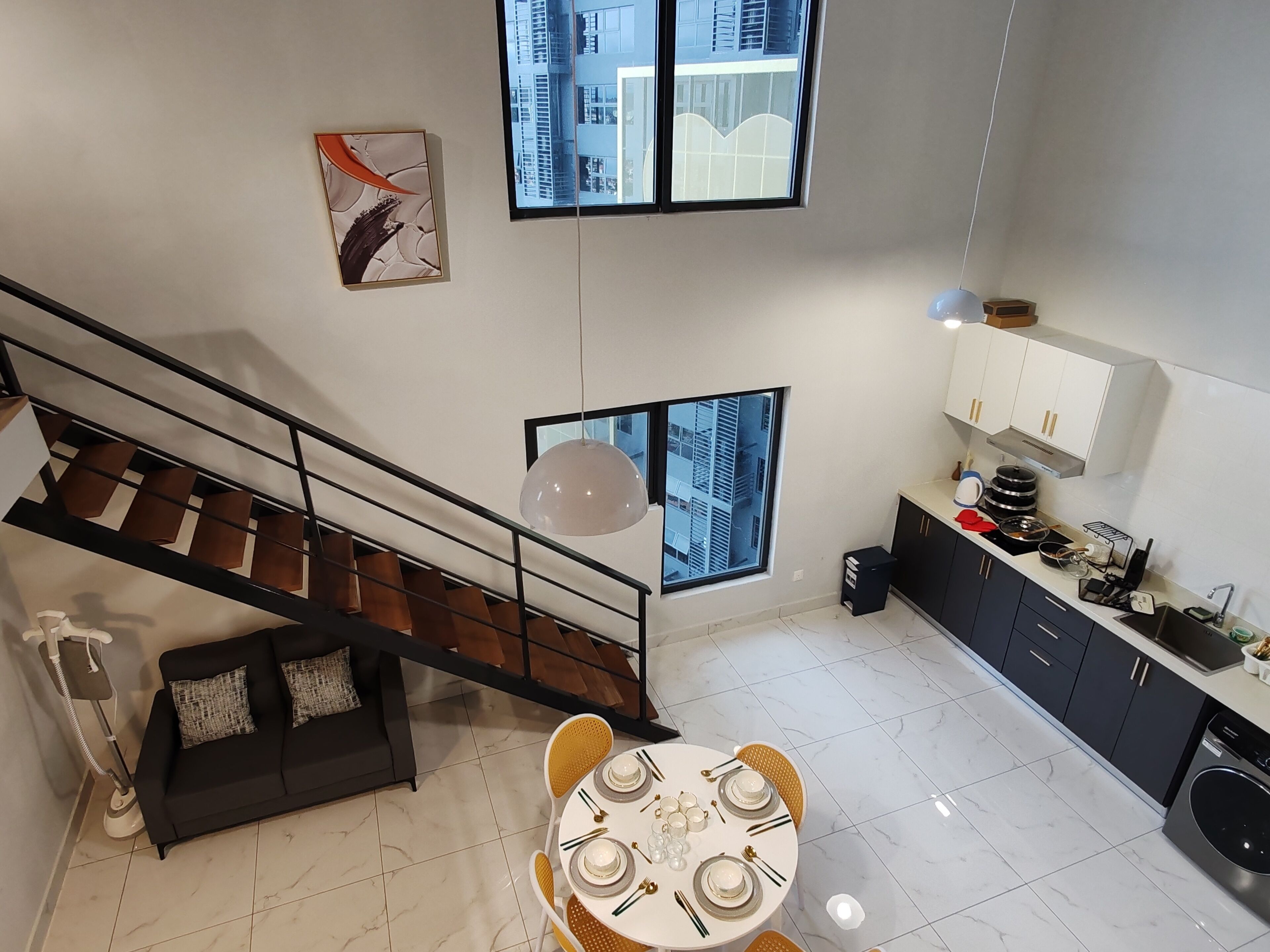 Full-sized fridge, cookware/dishes/utensils, cleaning supplies