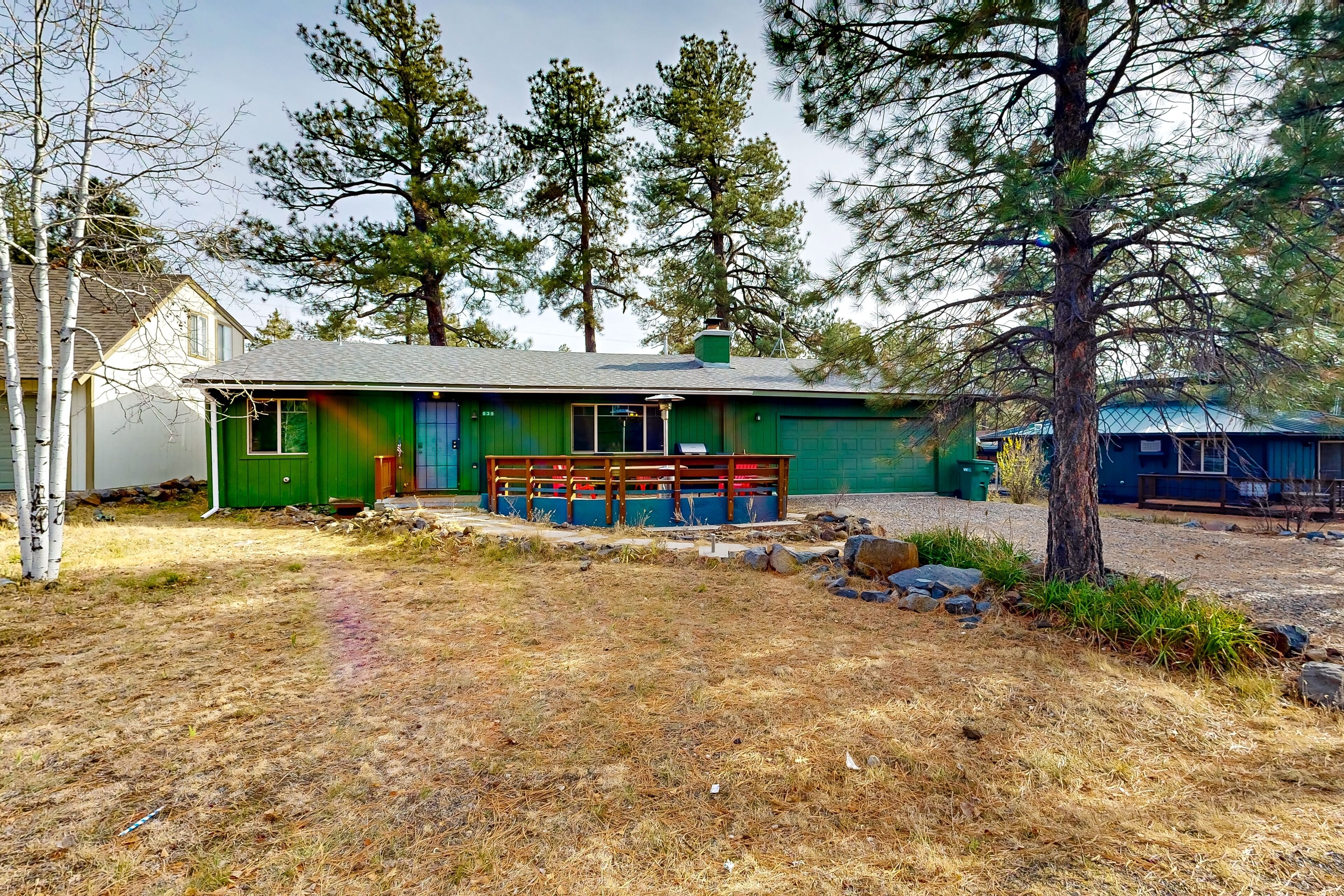 Dog-friendly rustic retreat with enclosed yard, grill, wood stove, games, & W/D