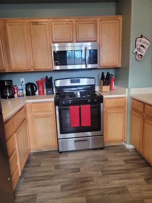 Fridge, microwave, oven, stovetop - Comfortable 3 Bedroom 2.5 Bath Family Home in North Las Vegas (North Las Vegas)