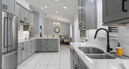 Sea Stone Waterfront Pool Home | Boat Dock | Close to Golf | Heated Pool | Dog Friendly
