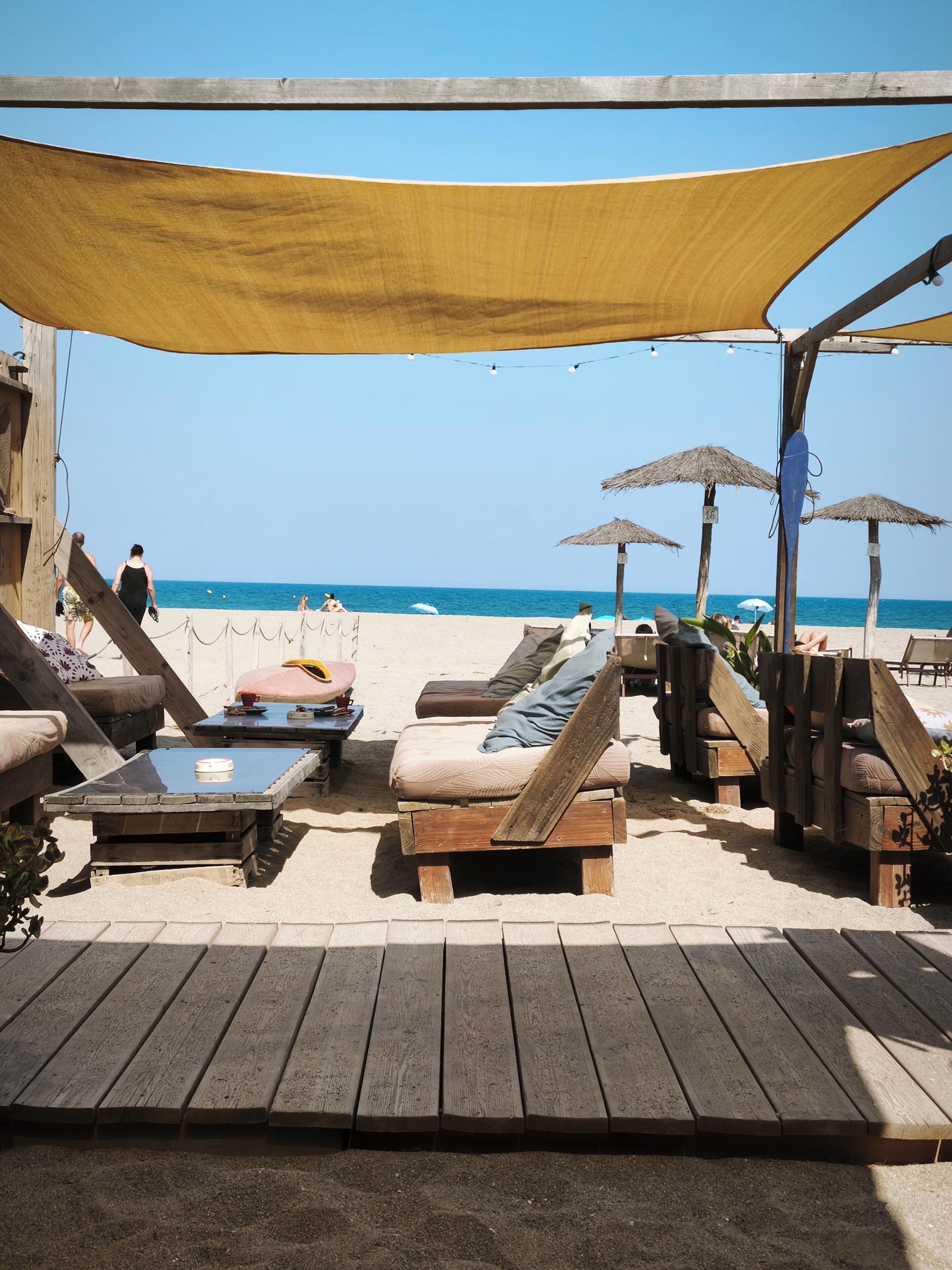 Beach umbrellas, beach towels, kayaking