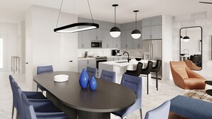 A modern kitchen with white cabinets, a central island, and pendant lighting. - Vor5474cd: 4 Bed, Imagination Lab, Pool (Orlando)