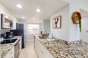 Fridge, microwave, dishwasher, coffee/tea maker