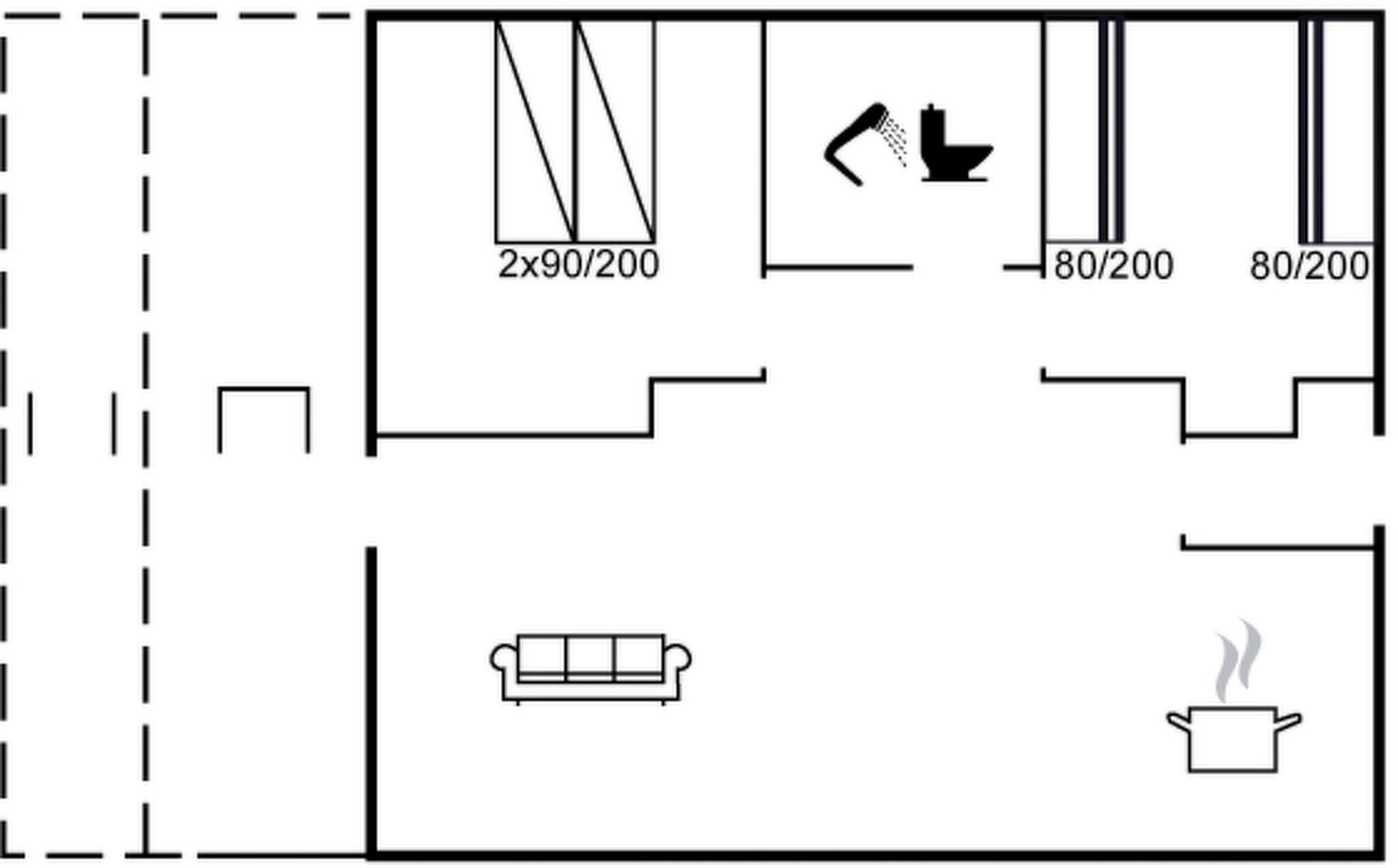 A floor plan with a kitchenette, a toilet, and a sofa.
