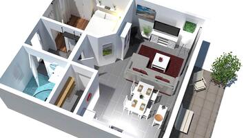 Distribución moderna de un apartamento con cocina, comedor, sala de estar y un balcón.