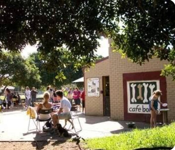 Cafe boba is situated in a park-like setting, offering a casual dining experience.