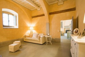 Apartment | Living area | 24-inch flat-screen TV with cable channels, fireplace