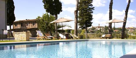Seasonal outdoor pool, pool umbrellas, sun loungers