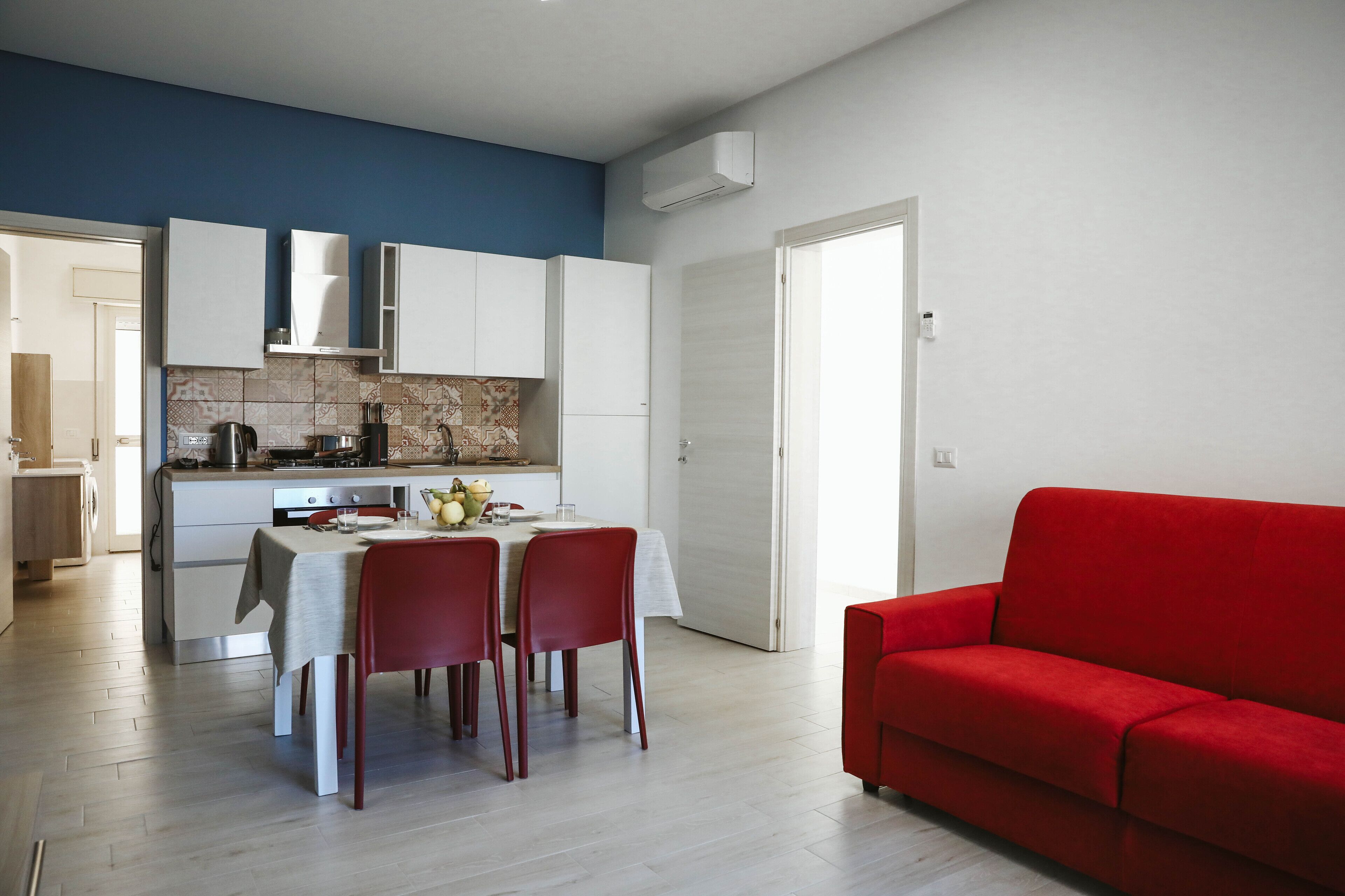 Comfort Apartment | Private kitchen | Full-sized fridge, electric kettle, cookware/dishes/utensils