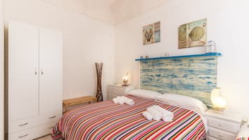 Departamento clásico | 1 habitación, tabla de planchar con plancha y ropa de cama