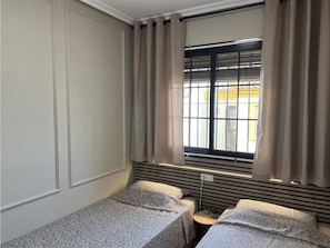 2 bedrooms, iron/ironing board, WiFi, bed sheets