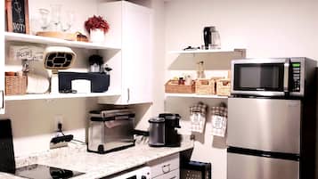 Fridge, microwave, stovetop, coffee/tea maker