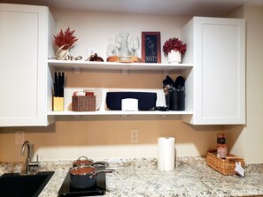 Fridge, microwave, stovetop, coffee/tea maker