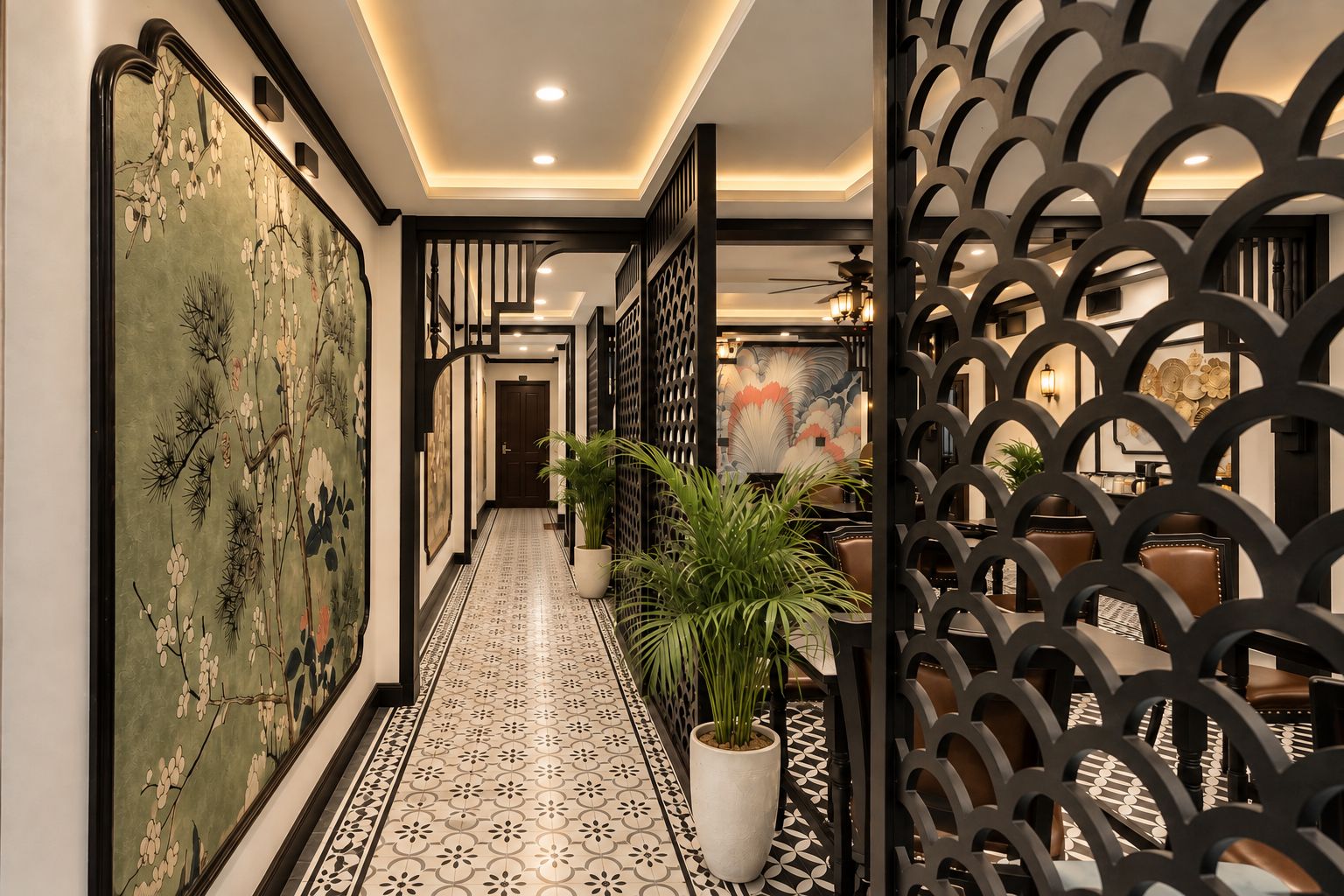 A hallway with a patterned floor, a potted plant, and a decorative wall.