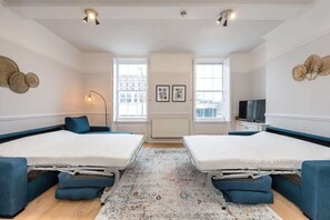 1 dormitorio, tabla de planchar con plancha, wifi y ropa de cama