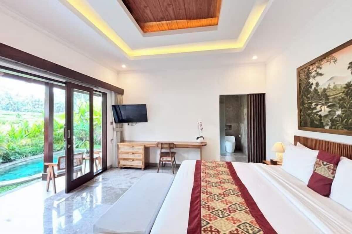1 kamar tidur, bantalan ekstra lembut, minibar, dan meja kerja