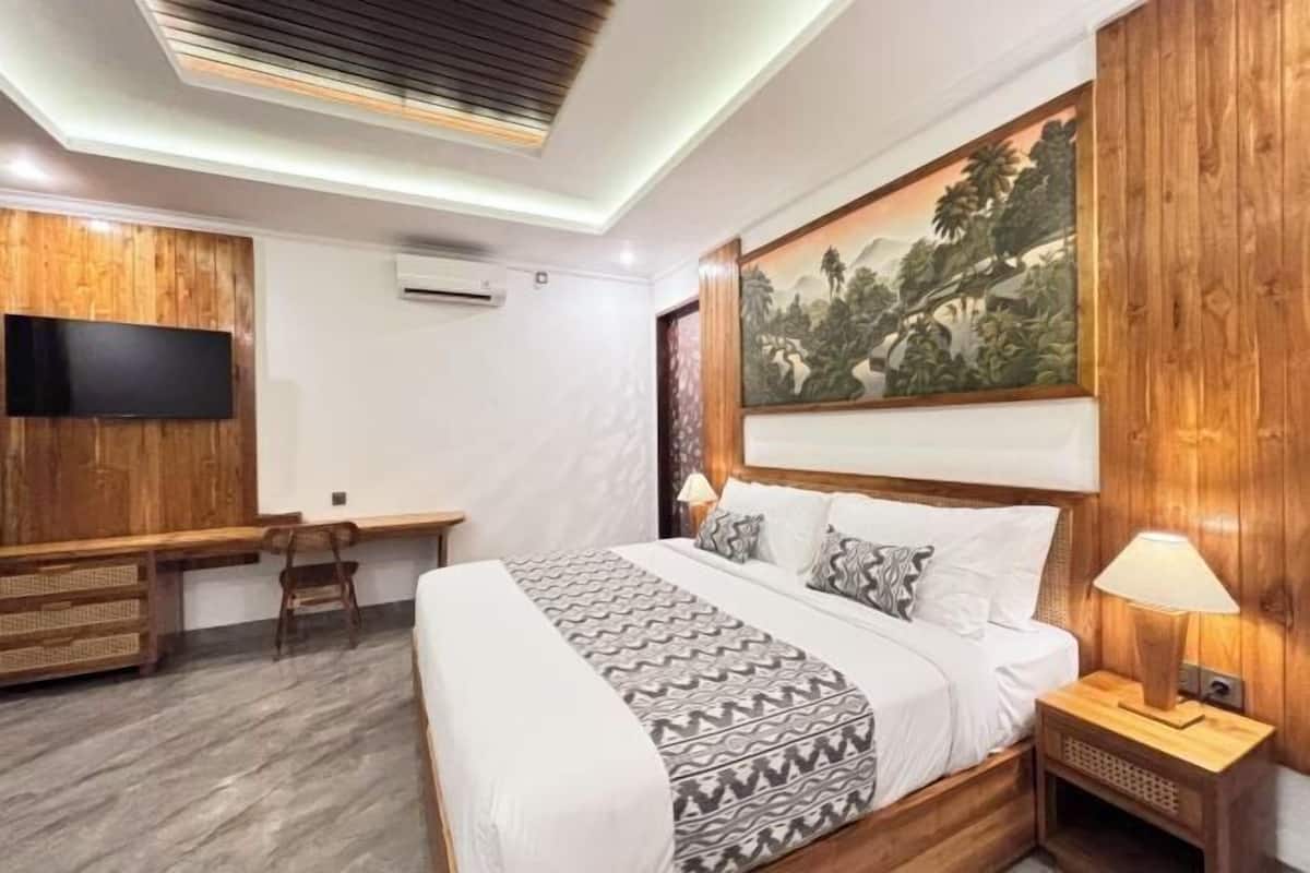 1 kamar tidur, bantalan ekstra lembut, minibar, dan meja kerja