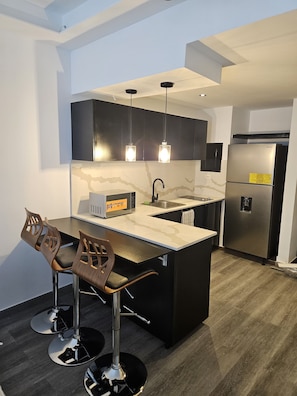 Microwave, oven, coffee/tea maker, electric kettle