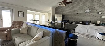 Beautiful spacious and unique house on canal close to Lake June, family friendly