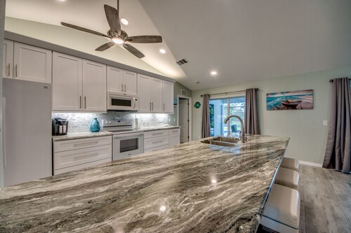 Pristine pool home ready for your vacation with friends or family .. 