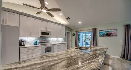 Pristine pool home ready for your vacation with friends or family ..