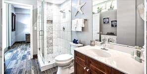 Shower, hair dryer, towels, soap - Luxury Beach Front Corner Unit Condo with Stunning Panoramic Ocean Views (Panama City Beach)