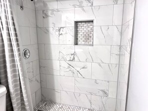 Hair dryer, towels, soap, shampoo