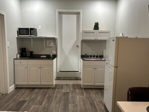 Fridge, microwave, stovetop, coffee/tea maker