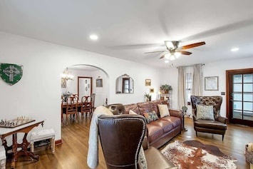 Gorgeously decorated living room with renaissance decor and cozy seating