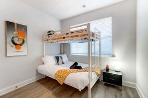 4 bedrooms, desk, iron/ironing board, travel cot