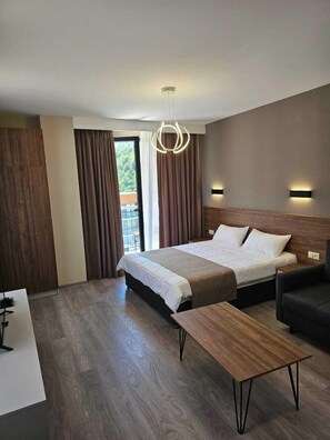 Design-Apartment | 1 Schlafzimmer, Daunenbettdecken, Minibar, schallisolierte Zimmer