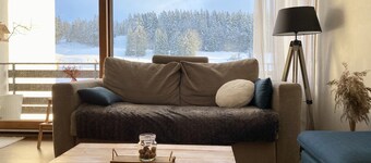 At the foot of the slopes balcony with view and wood-burning stove