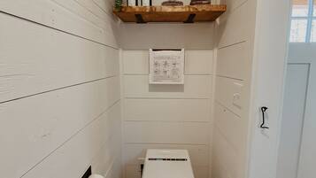 Shower, eco-friendly toiletries, hair dryer, towels