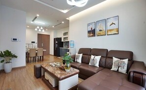 Departamento urbano | Área de sala de estar | Smart TV de 55 pulgadas con canales digitales y Netflix 