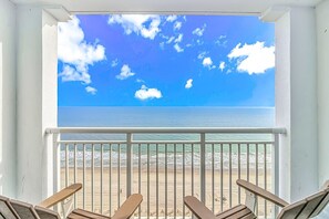 A balcony with a view of the ocean and beach. - Camelot By The Sea 1614 (Myrtle Beach)