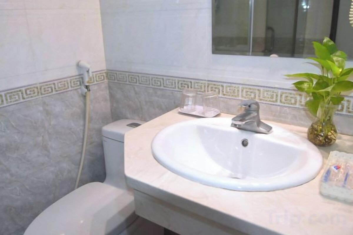 Shower, slippers, towels, soap