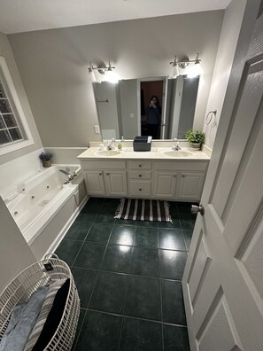 Jetted bath, hair dryer, towels, soap