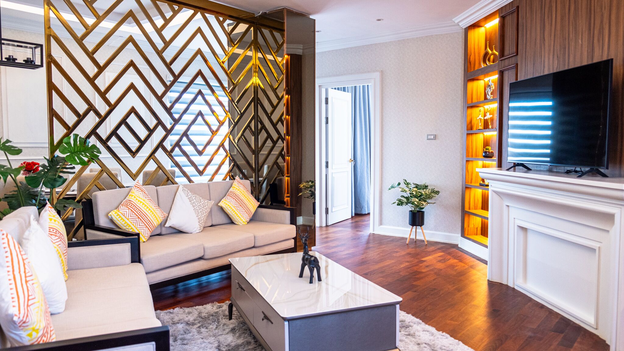 Presidential Studio Suite | Living area | 55-inch flat-screen TV with digital channels, TV, fireplace