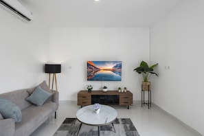 Villa | Living area | 55-inch TV with satellite channels, Netflix, streaming services